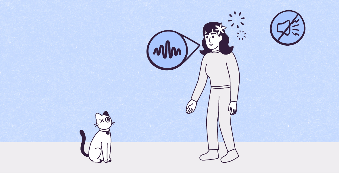A vector illustration on a Light Night Snow blue paper-textured rectangle with an Off-White rectangle at the bottom, shows Lily standing in front of Violet, sitting at her left, facing her, with her legs on the floor and her tail up and wavy. A blue speech bubble is coming from Lily’s mouth with a wavy horizontal line inside it; two similar circles of ray lines float at the right side of her head; a Night snow blue icon on the top right corner of the image shows a megaphone with zigzag lines spurting out of it crossed out by a diagonal line.